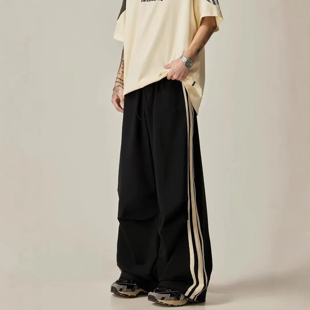 Black men's wide-leg climbing pants with high-waist design and straight silhouette