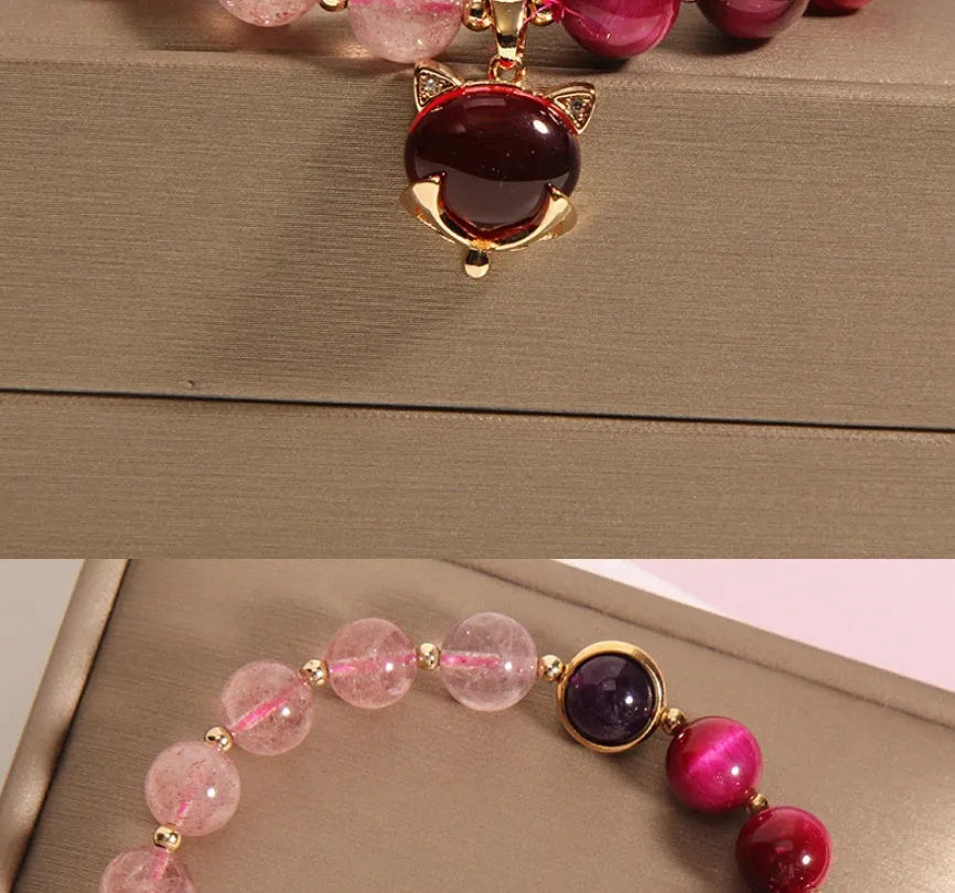 Women's simple strawberry crystal elastic bracelet showing natural stones on stretchable 18cm band