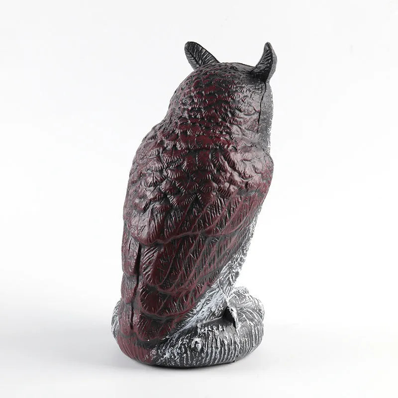 Three artificial plastic owls in red or white for garden pest control, each 20cm tall