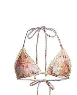 Women's creamy-white floral bikini set with top, briefs, and skirt for beach swimming
