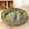 Grey and green reversible donut cat bed shown in small, medium, and large sizes
