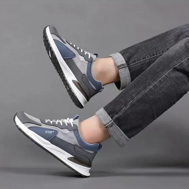 Men's colour block mesh sneakers in black, grey, and white with a lace-up design.