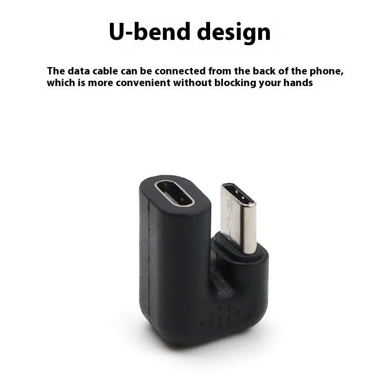 Four white USB-C Male to Female adapter cables with a U-bend shape on a grey background.