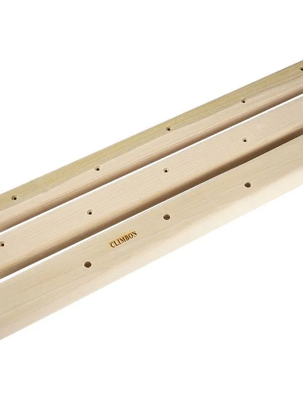 Set of three solid wooden fingerboard hangboards for grip strength training in different lengths.