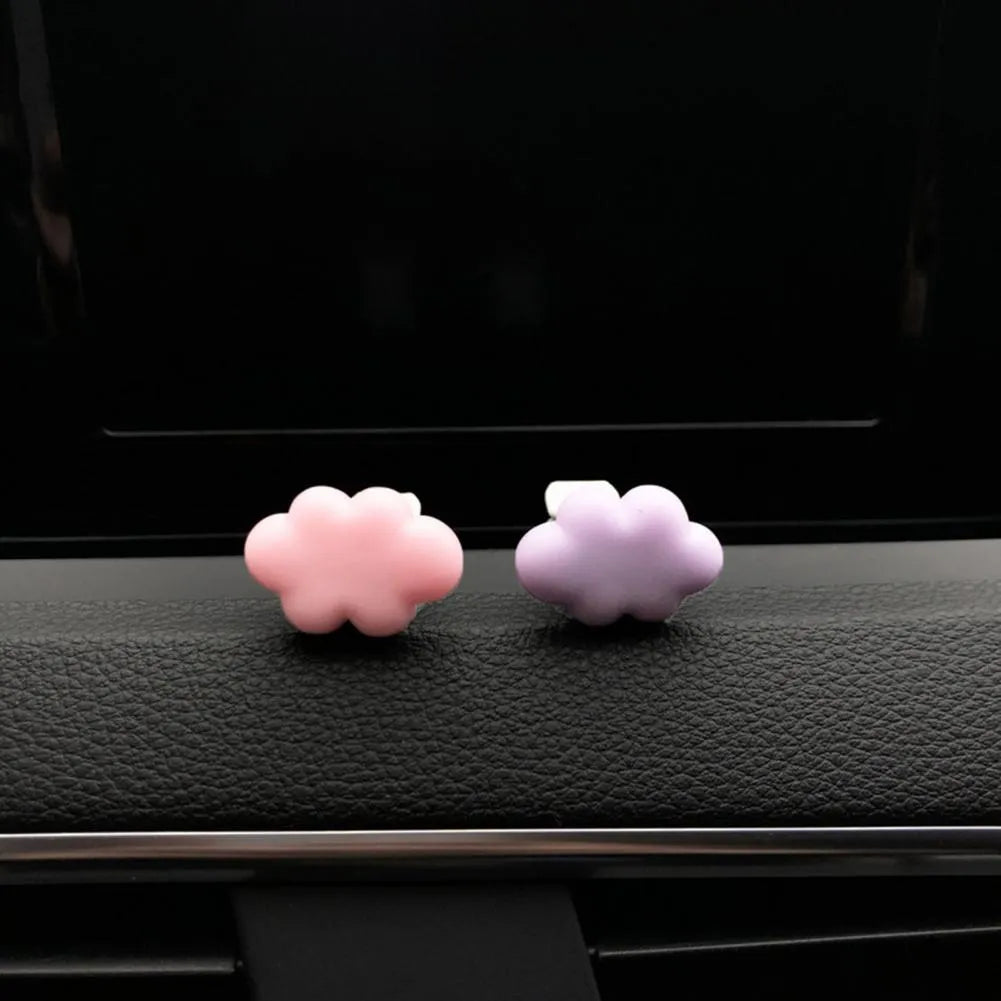 Resin Baiyun cloud cartoon car air freshener clip in pastel colours for vehicle vents.