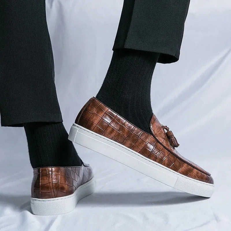 Men's black plus size business casual sneakers with a tassle detail on the artificial PU upper.