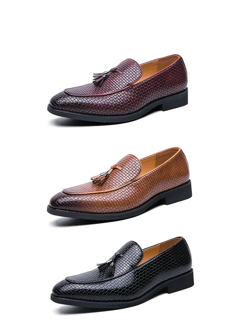 Men's black pointed slip-on shoes with a tassel detail on the front, made from artificial PU.