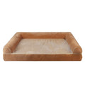 Square blue cloth dog bed with sponge fill on a wooden floor