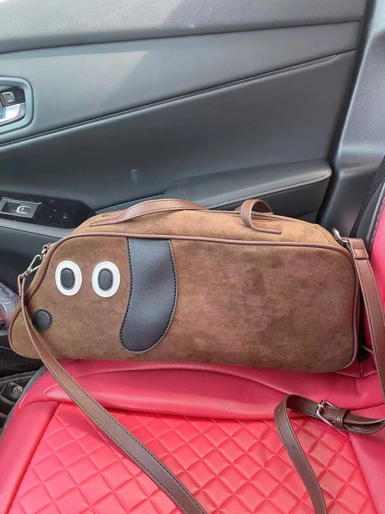 Virtue Pull sausage dog crossbody shoulder bag in toast brown colour, cotton material, large capacity, zipper closure.