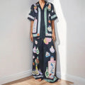 Black women's cardigan and trousers set with cartoon pattern in sizes S M L XL 2XL 3XL