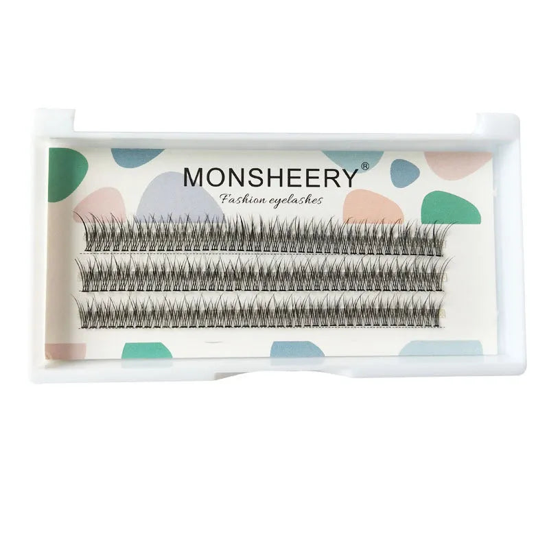 Black V-shaped fairy fishtail false eyelashes showing segmented design in natural long style