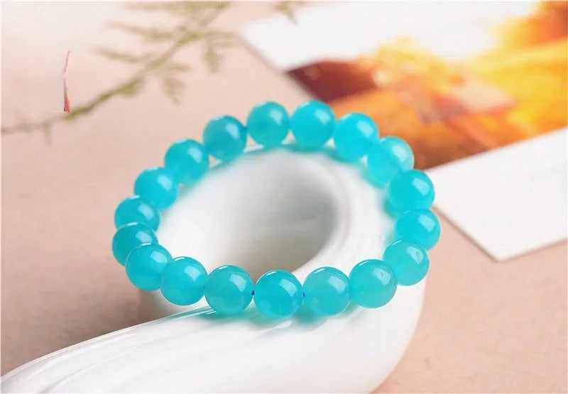 Natural Amazonite scattered beads bracelet with polished finish in ice blue-green colour