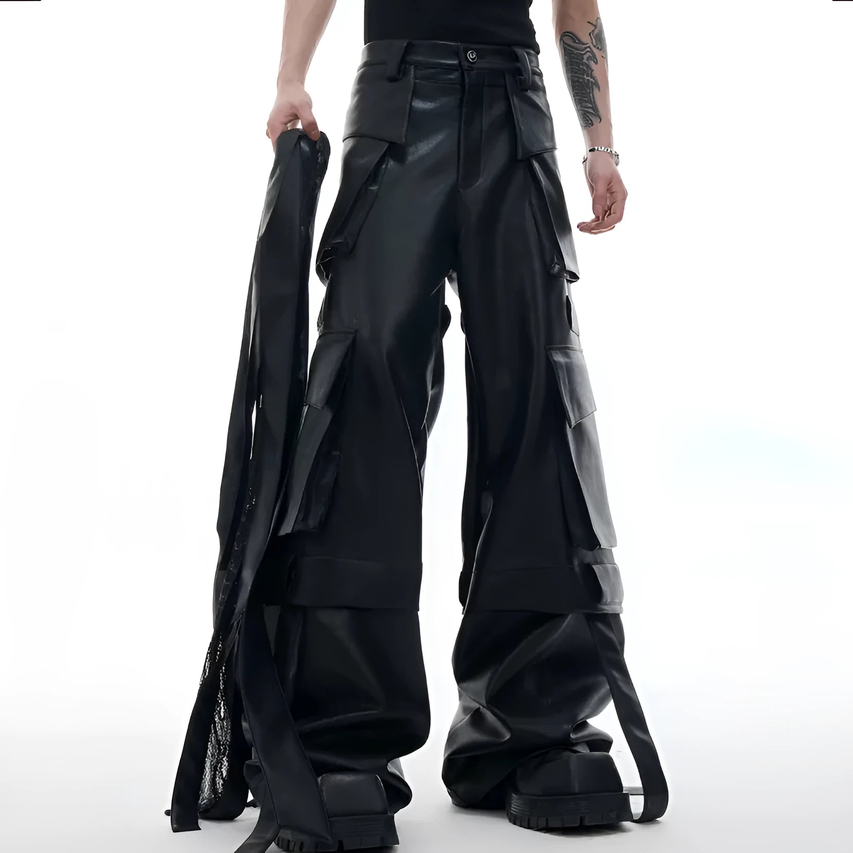 Black retro loose leather pants with quilted panels and multiple pockets