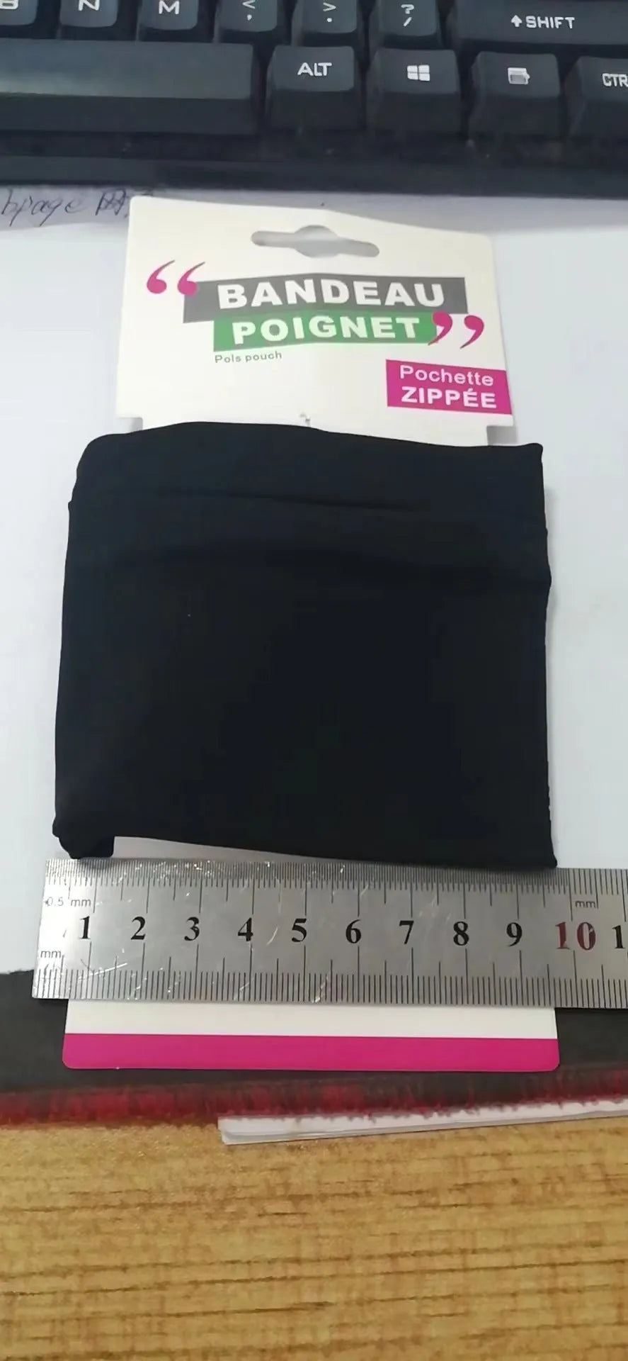 Wrist bag armband sleeve measuring 10cm by 10.5cm with water-resistant OPP packaging