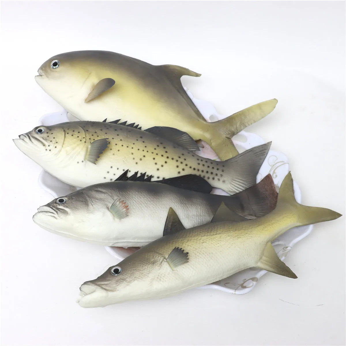Three PU simulated fish model ornaments showing yellow-fin tuna, yellow croaker, and flower fish designs