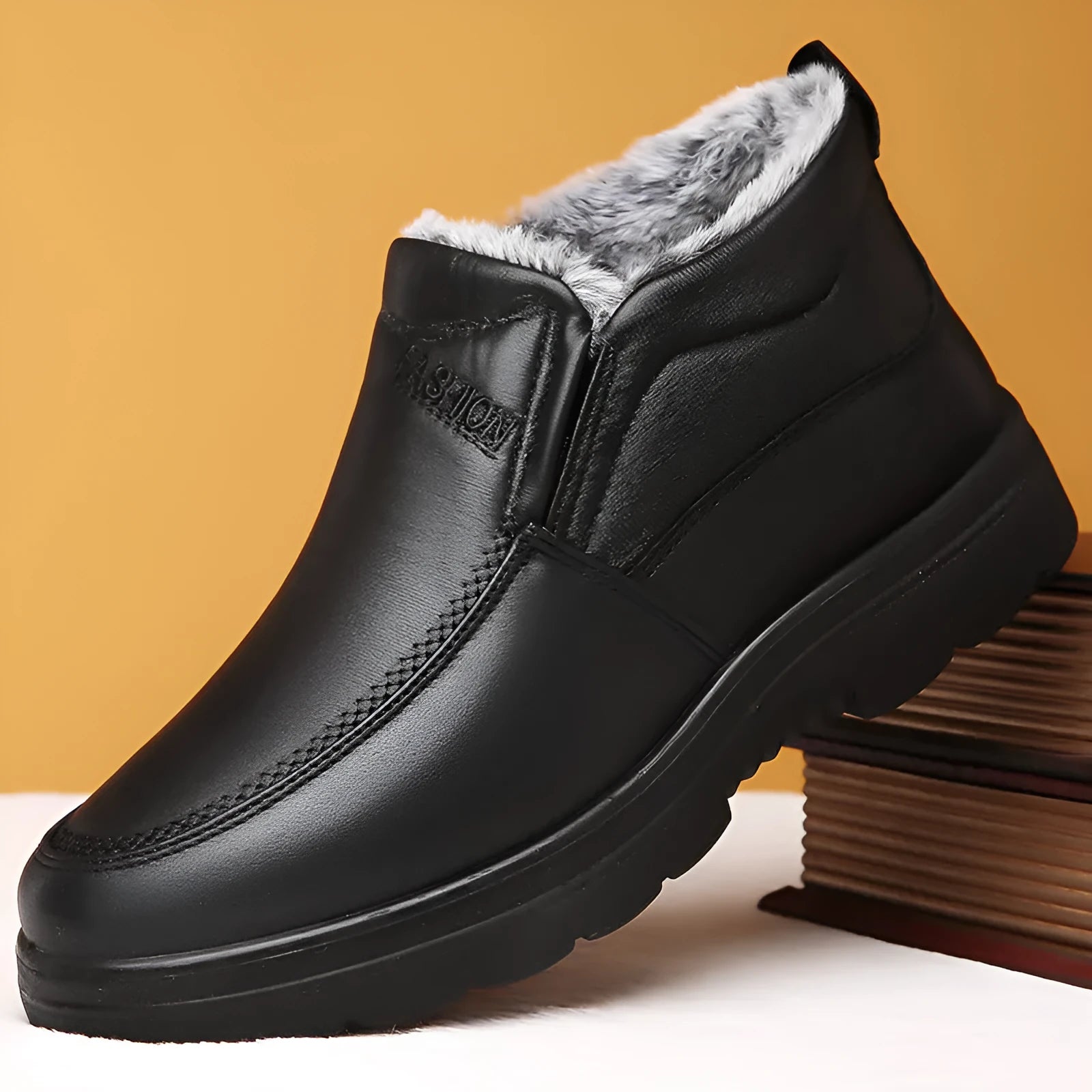 Men's black and brown fleece-lined winter slip-on shoes with a non-slip rubber sole.
