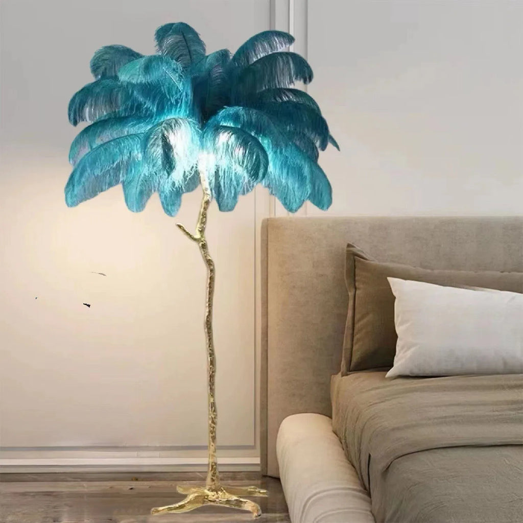 Tall decorative floor lamp with many resin feathers in choice of dark green, pink or white colour