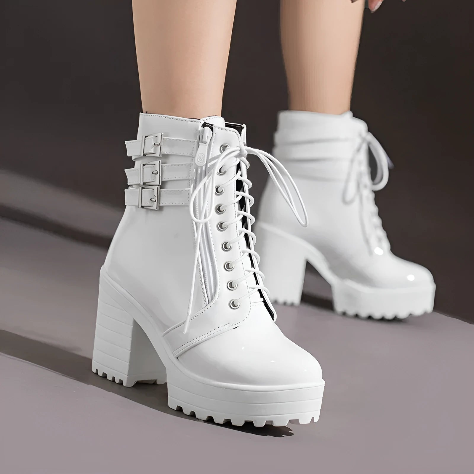 Women's black thick-heeled casual short boots with round toe and front lace-up.