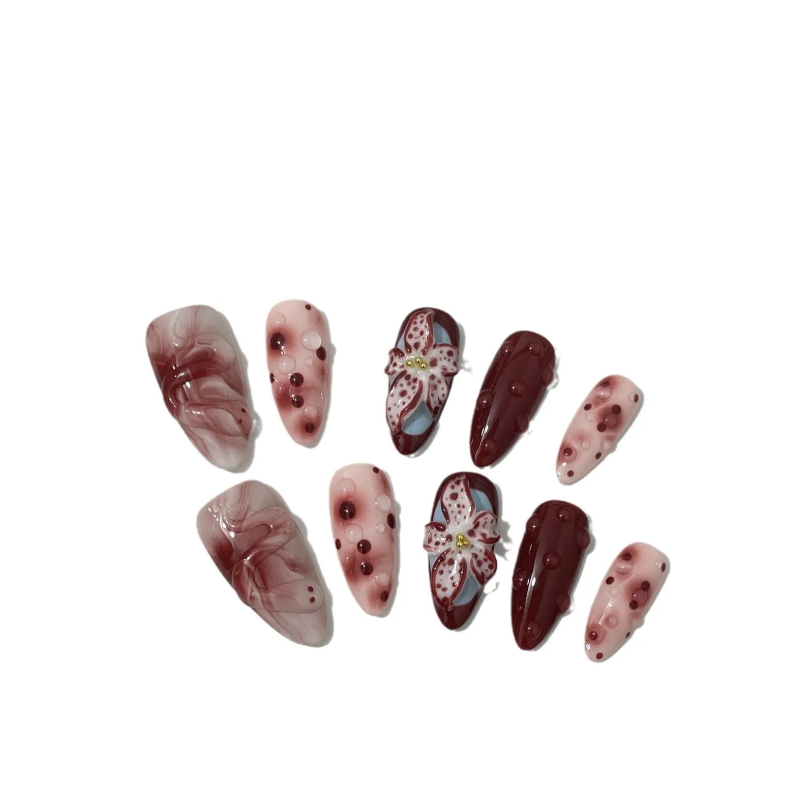 Hand-painted three-dimensional carved artificial nails in almond shape with floral and geometric patterns