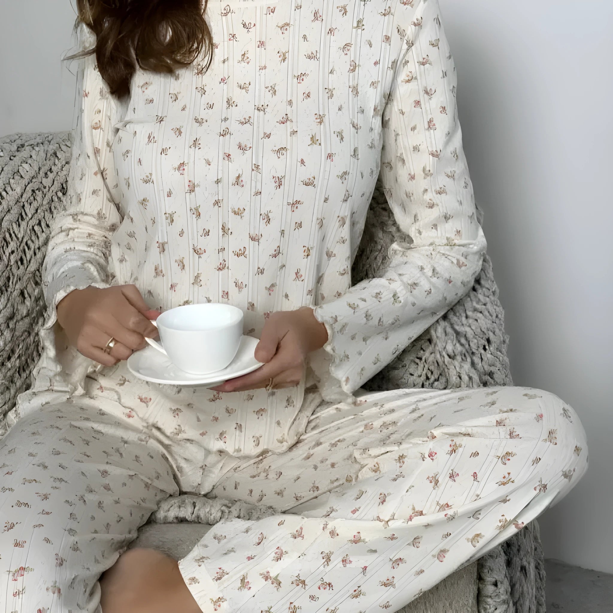 Women's white floral print lounge suit with bell sleeves and wide leg trousers