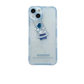 Clear silicone phone case with blue astronaut print, shown fitted on an iPhone.