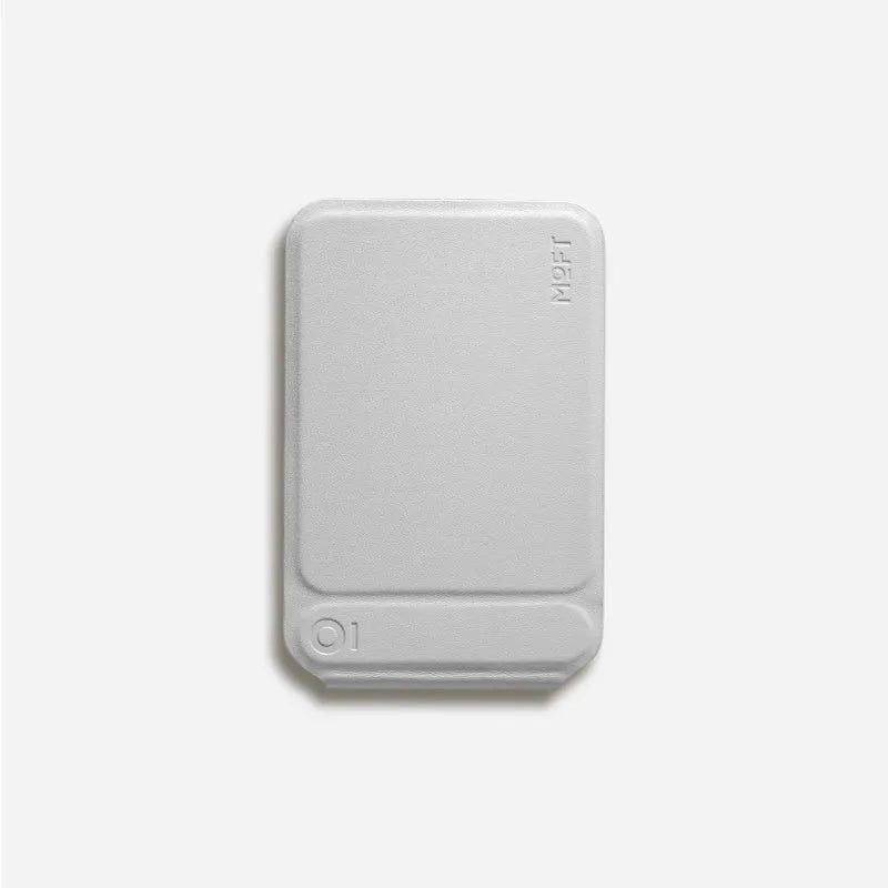 Magnetic mobile phone holder case in MOVAS plain leather showing four colour options: black, blue, green and grey