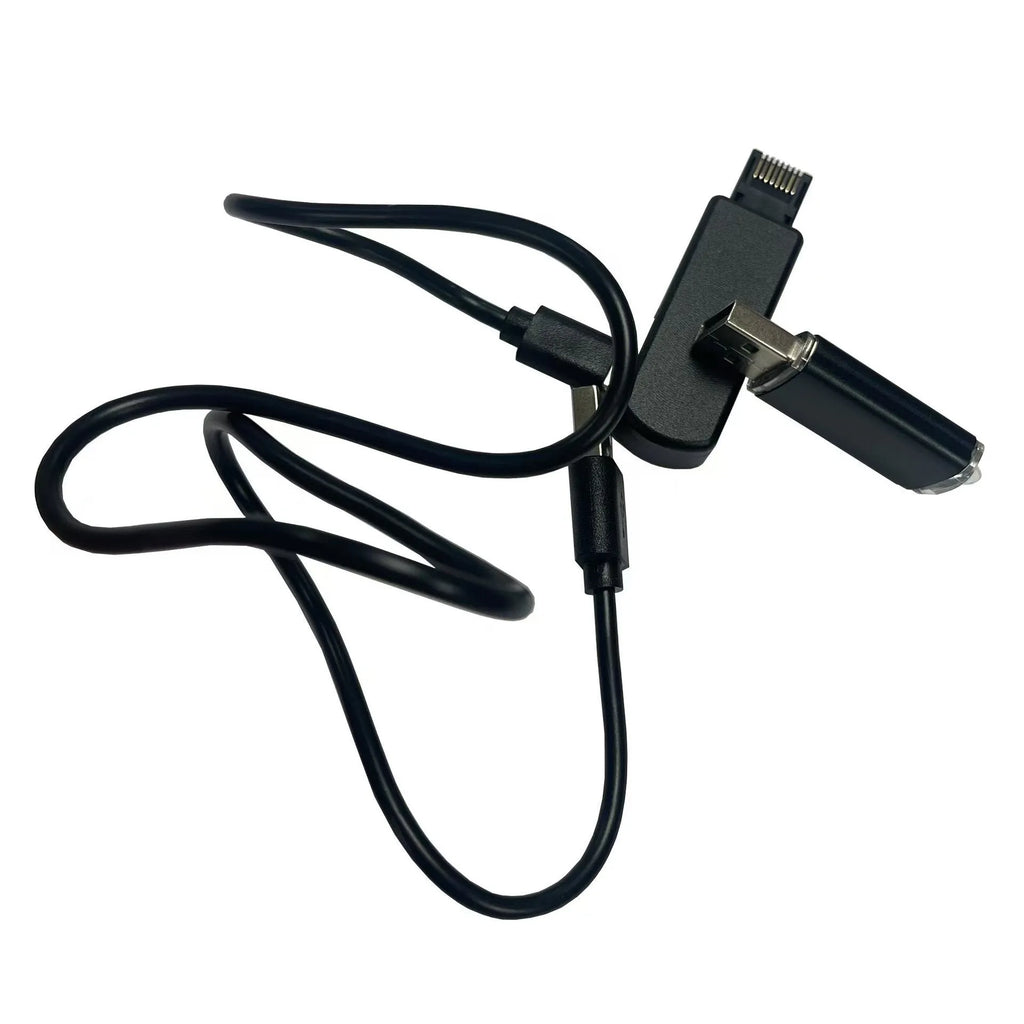 Black JB Tool USB adapter for PS5 console with Ethernet port, shown with USB cable.