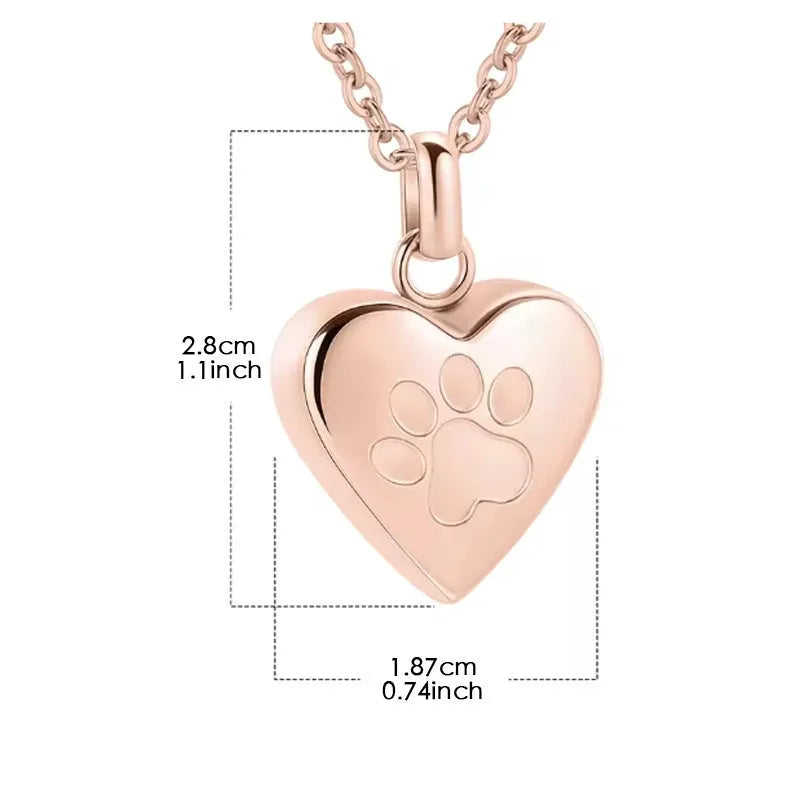 Silver heart-shaped titanium steel casket necklace with a paw print, shown open and closed.