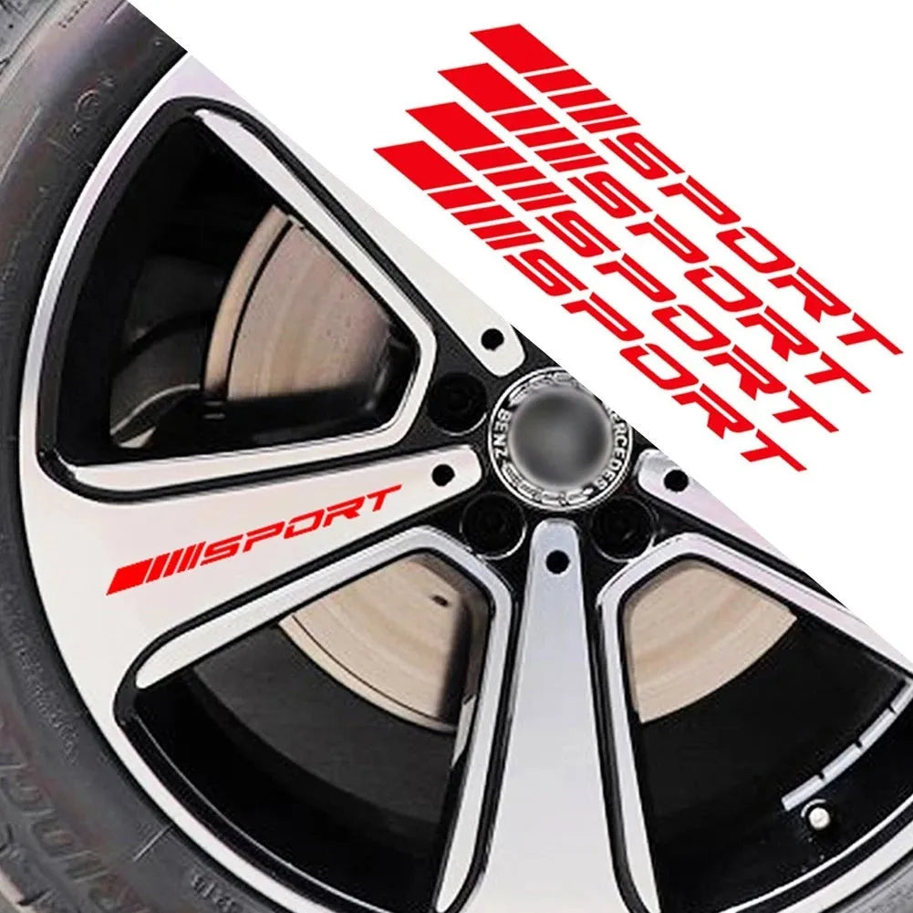 Red hollow sports design car rim sticker on a silver alloy wheel.