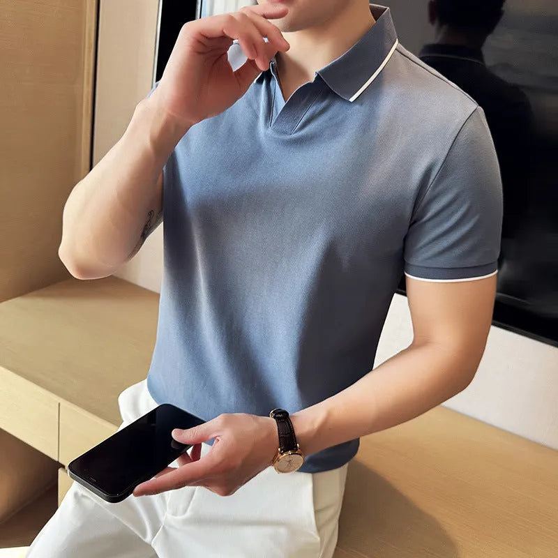 Men's short sleeve lapel polo shirt in cotton blend fabric, shown in a solid colour.