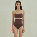 Brown triangle cut one-piece swimsuit for women on hanger showing front design