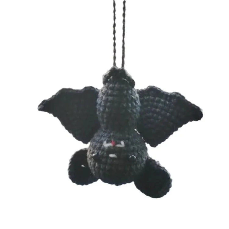 Plush hand-woven car hanging ornament in cartoon design options including ghosts, bats, and pumpkins