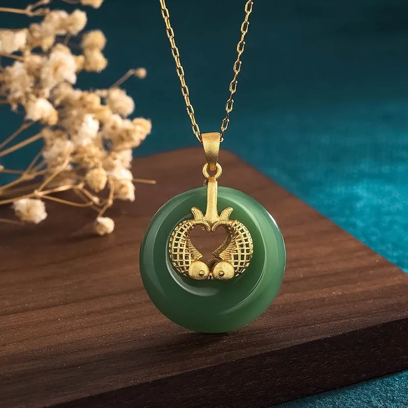 Gold koi animal zodiac necklace with green inlay pendant on adjustable chain