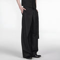 Black straight-leg trousers with a single pleat and adjustable waistband on a plain background.