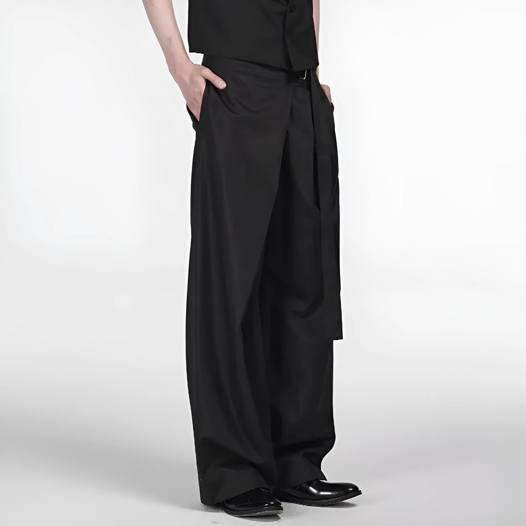 Black straight-leg trousers with a single pleat and adjustable waistband on a plain background.