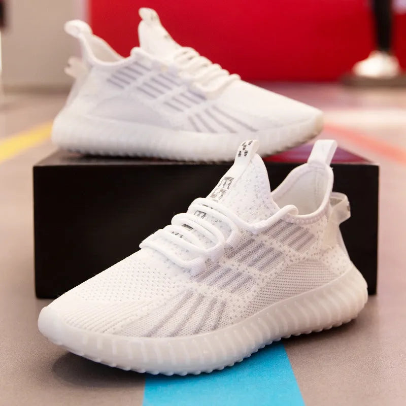 Men's white breathable sports shoes with platform heel and mesh lining on a white background