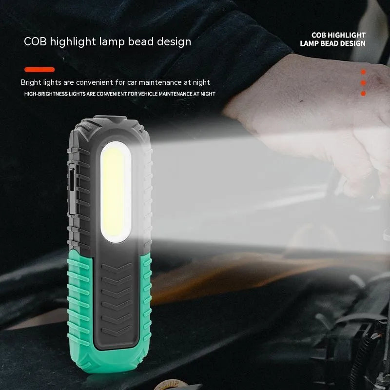 Black and green USB auto repair work light with PET-coated ABS plastic construction