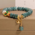 Women's blue water jade abacus bead bracelet with alloy inlay and butterfly charms