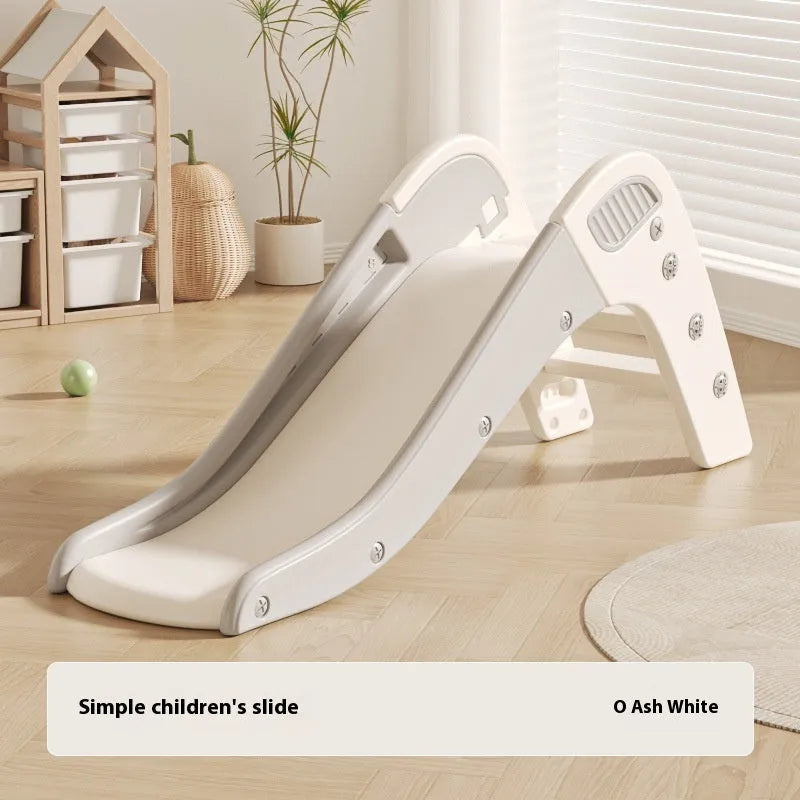 Small blue plastic baby slide for indoor play and early development.
