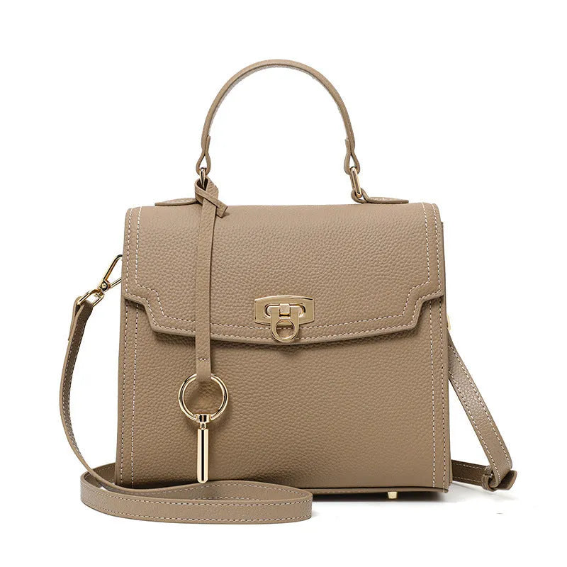Elephant grey vintage handbag with litchi pattern leather and lock clasp