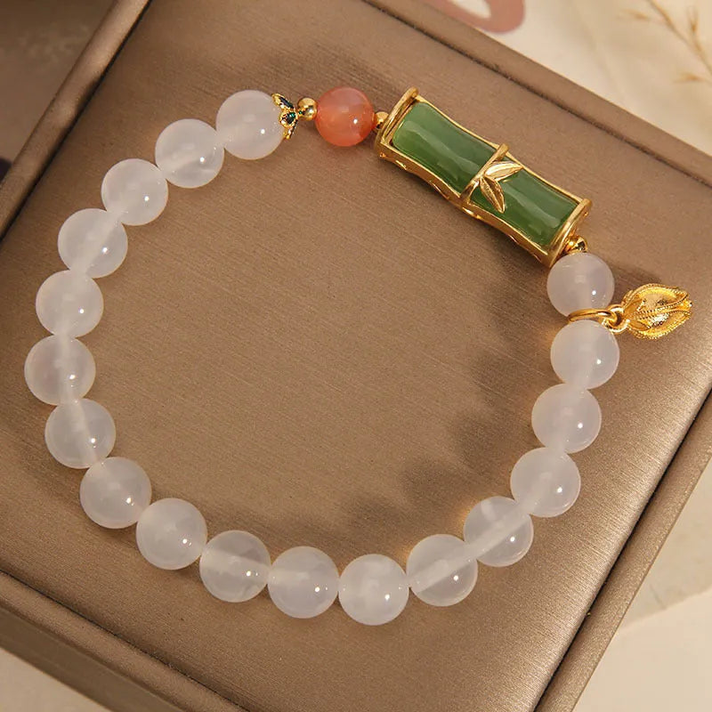 White agate jasper bracelet with a natural jade bead and bamboo joint design
