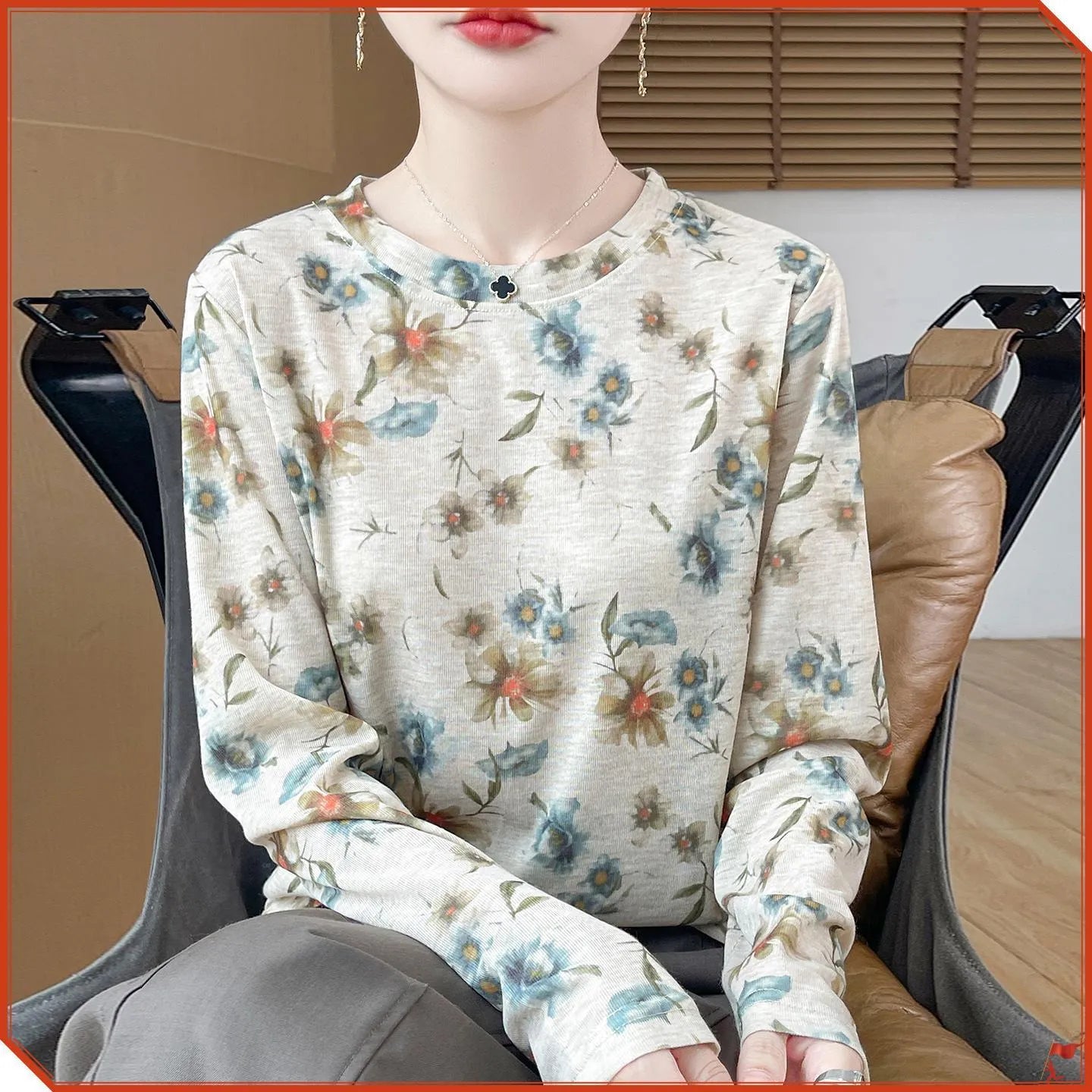 Women's round neck pullover shirt in Tencel cotton with a yellow roses floral print design.