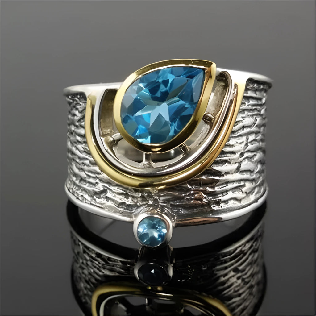 Blue Chinese style zircon ring with rhinestone detailing and drop shape on alloy band
