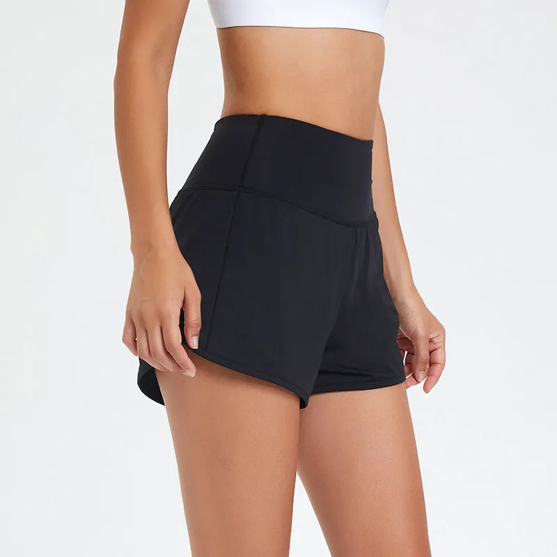 Women's black high waist nylon fitness shorts for running and gym workouts.