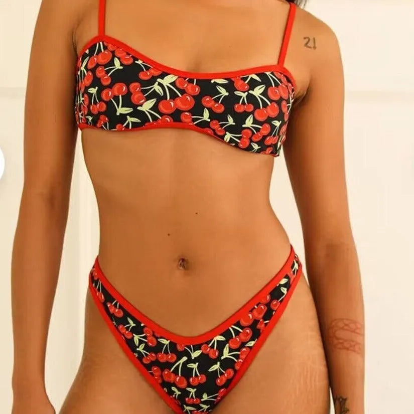 Women's cherry print floral tube top bikini swimsuit in polyester fabric.