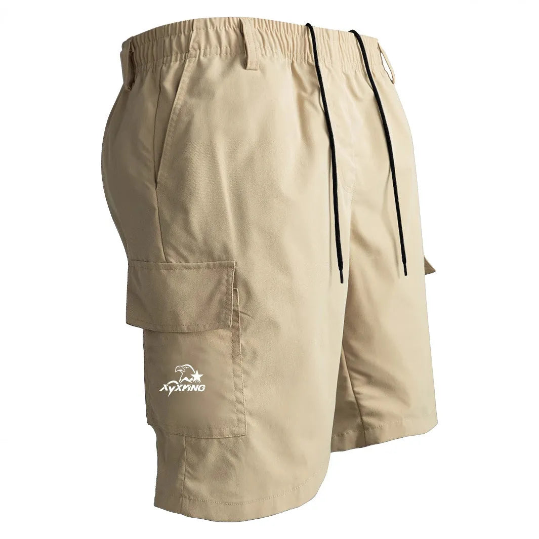 Man or woman wearing loose straight-cut black polyester casual sports shorts with a micro-elastic fabric.