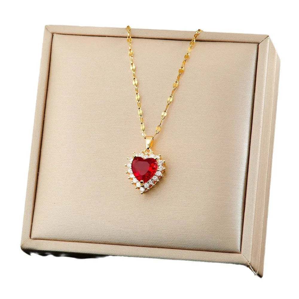 Women's gold-red titanium steel jewellery set with heart flower pendant and mixed gemstone inlay