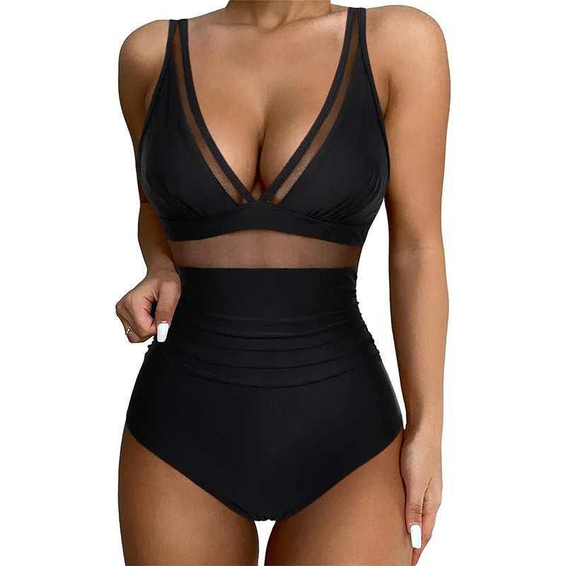 Black mesh halter bikini one-piece swimsuit on model showing sleeveless design and briefs style
