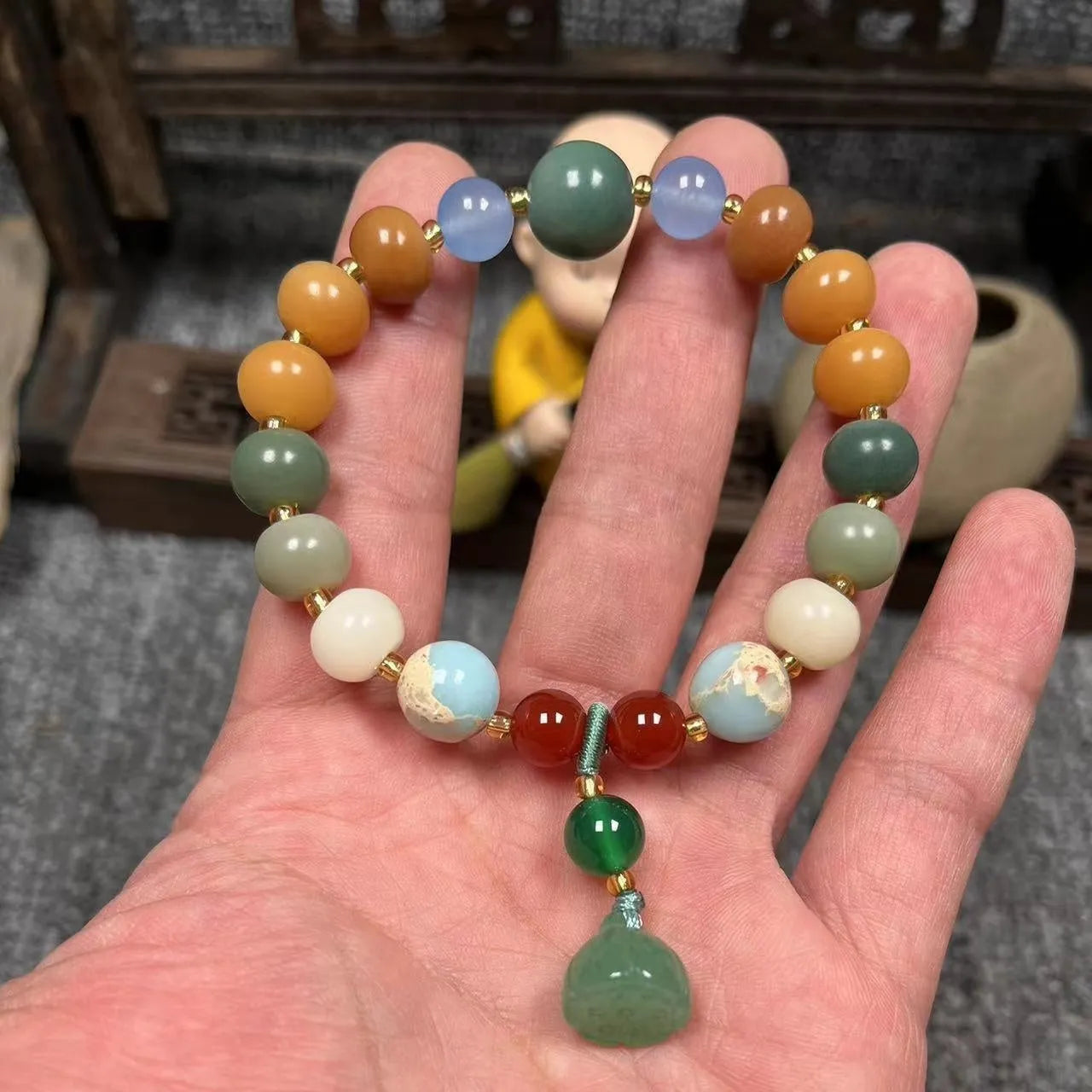 Carved pumpkin lotus Bodhi root bracelet with white jade beads and multiple dimensions