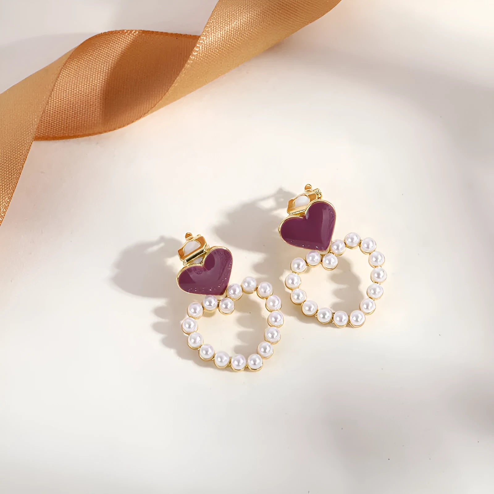Geometric tassel clip-on earrings in brass and stainless steel for women without pierced ears.